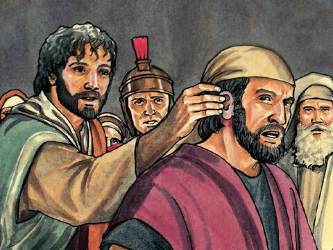Puis il toucha l'oreille de cet homme et le guérit. – Numéro de diapositive 16