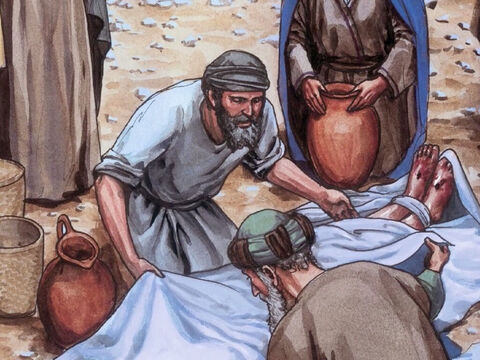 Ils prirent donc le corps de Jésus et l'enveloppèrent de bandelettes, avec les aromates, comme c'est la coutume d'ensevelir chez les Juifs. – Numéro de diapositive 9